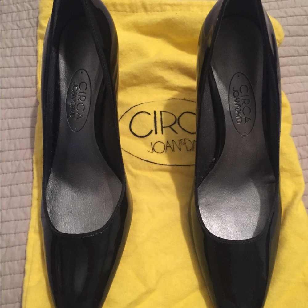 Joan and David black patten leather heals